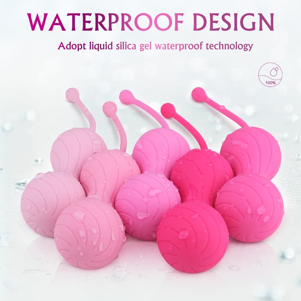 Spiral texture detail of pink weighted kegel balls